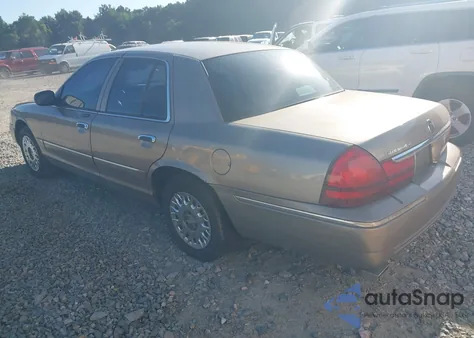 2003 Mercury Grand Marquis Gs z USA, uszkodzony, nr VIN 2MEFM74W33X698646